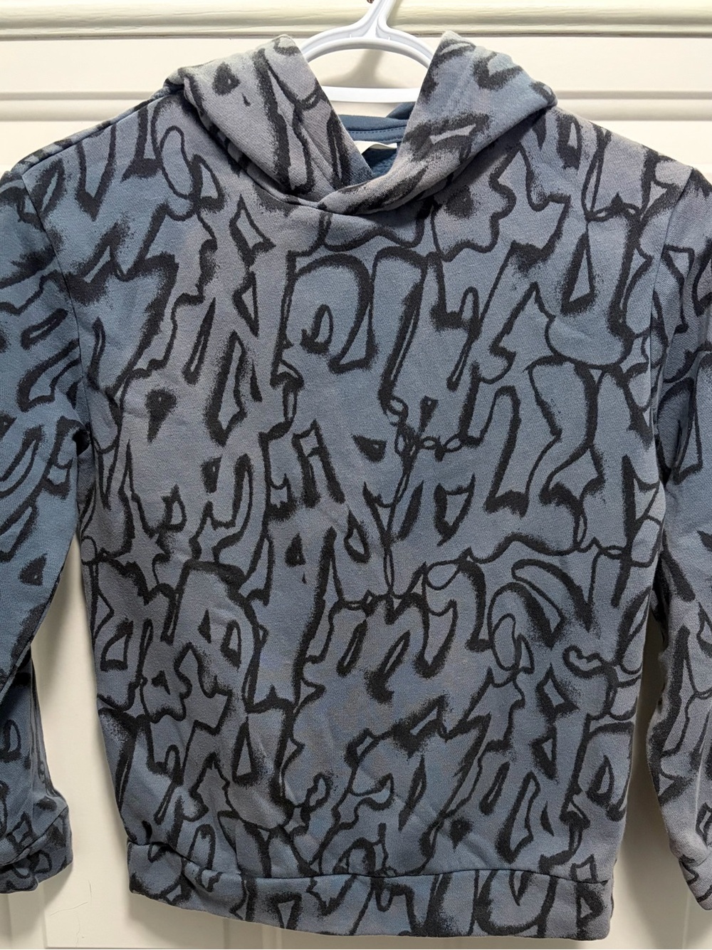 H&M Blue Turtleneck Sweater with Black Abstract Pattern